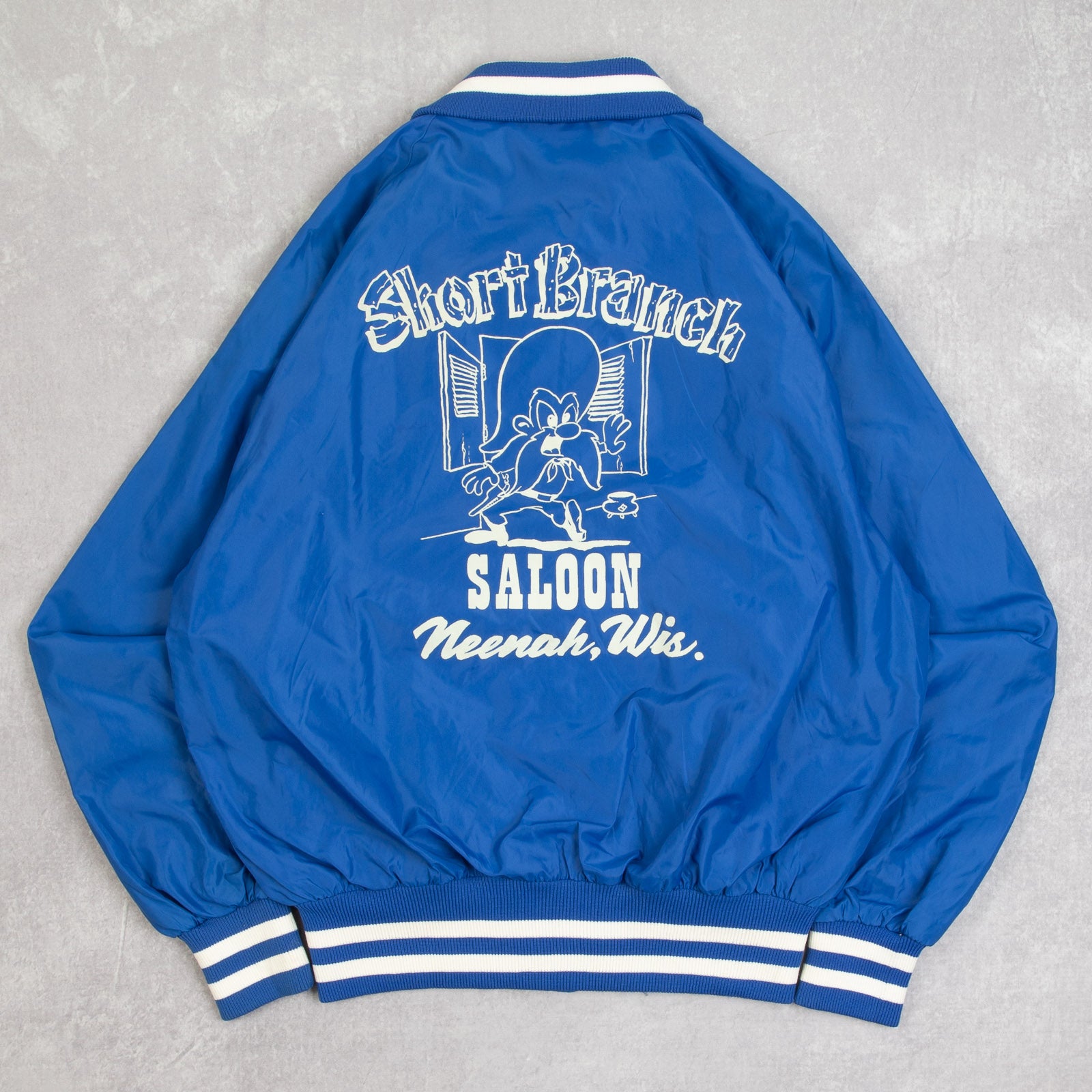 MEN'S VINTAGE 1980S SHORT BRANCH SALOON VARSITY BOMBER JACKET